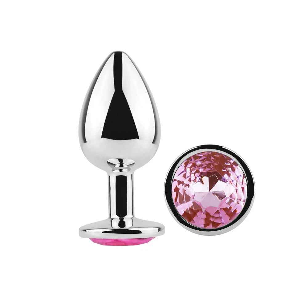 Single stainless steel butt plug showing tapered tip and sparkling pink jewel base Sex Toys in Uk, Cheap Sex Toys in Uk